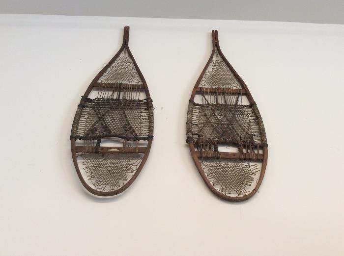 Lots of antique snow shoes, antique and vintage skis great for decorating!
