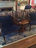 Two blue occasional barrel back chairs; small hexagon side table