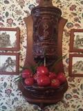        Vintage brown pottery wall-mount fountain