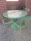             Patio glass top table & 4 chairs