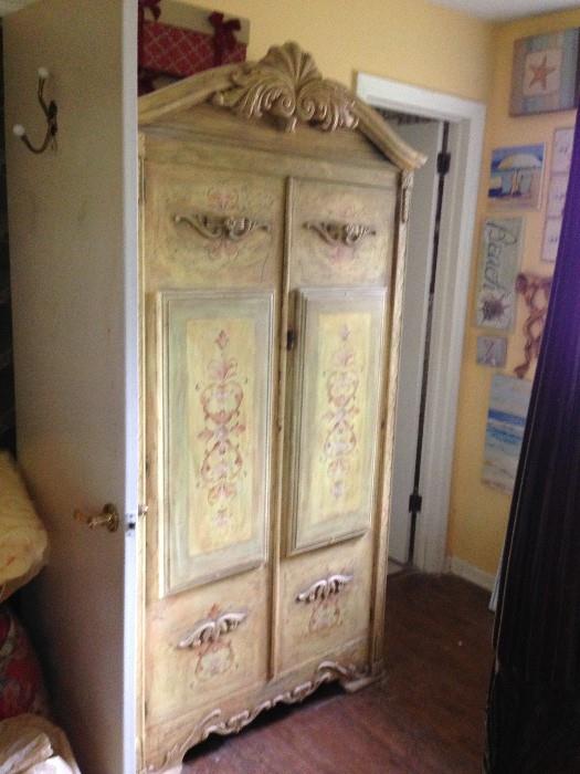 What a chifforobe ,cedar-robe,wardrobe,or armoire ! This piece has the looks, colors and interiors to dress up any room! Great storage, great looks and well made, unlike most of today's furniture!
