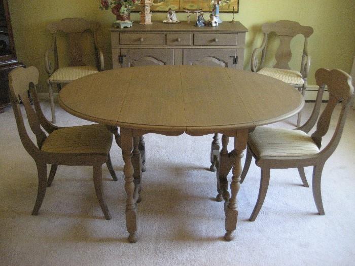 Drexel Table and Chairs.  There are 4 chairs and 2 more Table Leafs