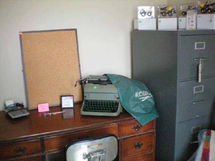 Desk, RC Allen typewriter, office supplies