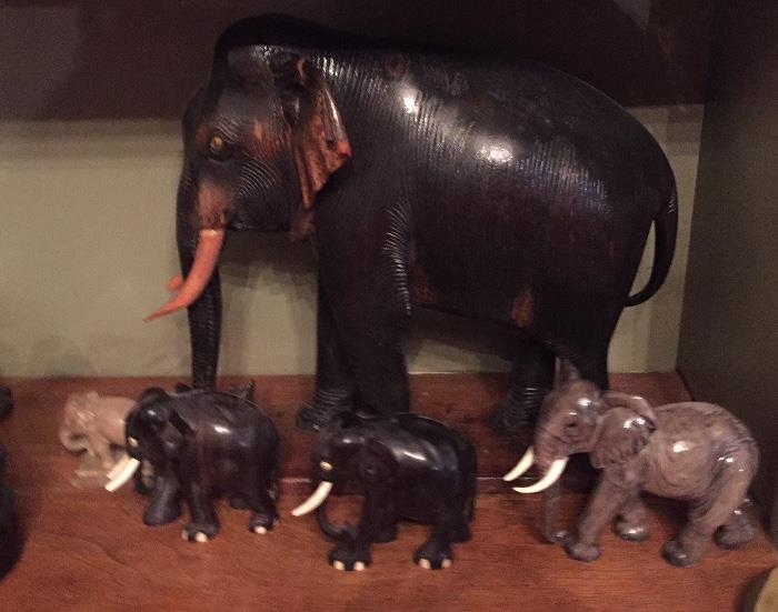 Collection of Elephants to include wood carved, alabaster and Goebel.