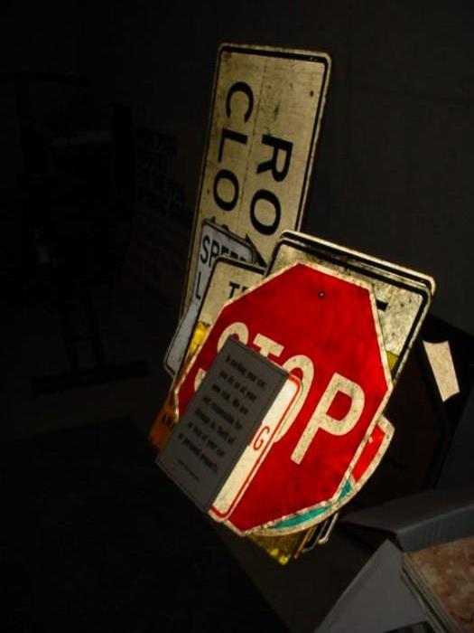 some of the MANY metal street and construction signs,