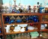 tons of glassware and oil lamps