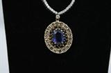 4.7 Carat Sapphire, 4.25 TCW Diamonds in 18K White Gold