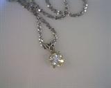 light fancy diamond pendant and chain in 14k white gold. 70ct diamond