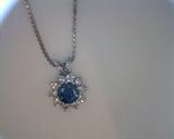 1ct irradiated  deep blue diamond pendant with .50ct white diamonds surrounding the center in 14k white gold with sterling chain