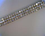 heavy 3 row CZ bracelet set in gold over sterling