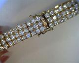 heavy 3 row CZ bracelet set in gold over sterling