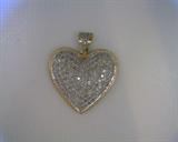 one carat diamond heart in 14k white and yellow gold