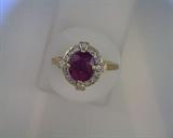 oval ruby /16 diamond     14K ring
