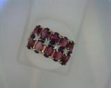 14K yellow gold 2 row garnet band with 4 diamonds