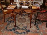 Beautiful Mahogany drop leaf English supper table with outstanding open carved work on each end, 19th Century.