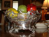 Very nice, wonderful size sterling footed basket with lots of open work.