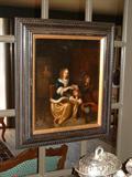 17th Century Dutch Oil on Board of Mother with Children in a custom frame.