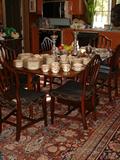 This photograph features an Outstanding Irish Drop Leaf Antique Supper Table.