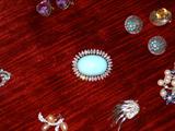White Gold Brooch with Turquoise Cabochon and Diamonds.
