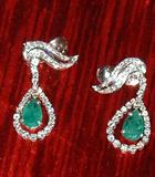 White Gold earrings with Diamonds and Pear Shaped Emerald Pendants.