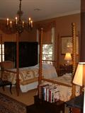 New England 19th Century tall four poster twin size spool beds.