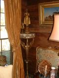 Early 19th Century carved wood and gilt tall corner shelf.