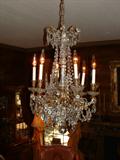 19th Century French six arm Chandalier with heavy cut prisms.