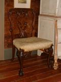 A very fine mid 19th Century heavily carved English side chair.