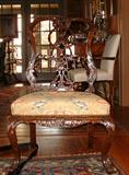 19th Century English Hand carved ribbon back side chair, one of two.