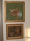 A neelde point of dogs and a hand colored print.
