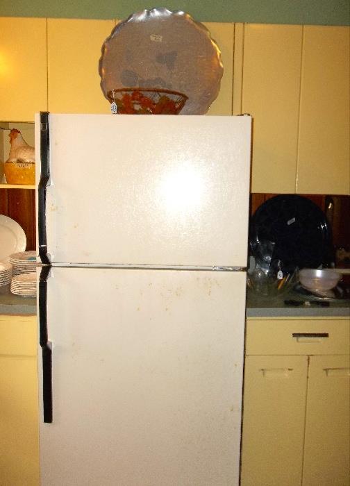 Working fridge with top freezer - good size - reasonably priced.