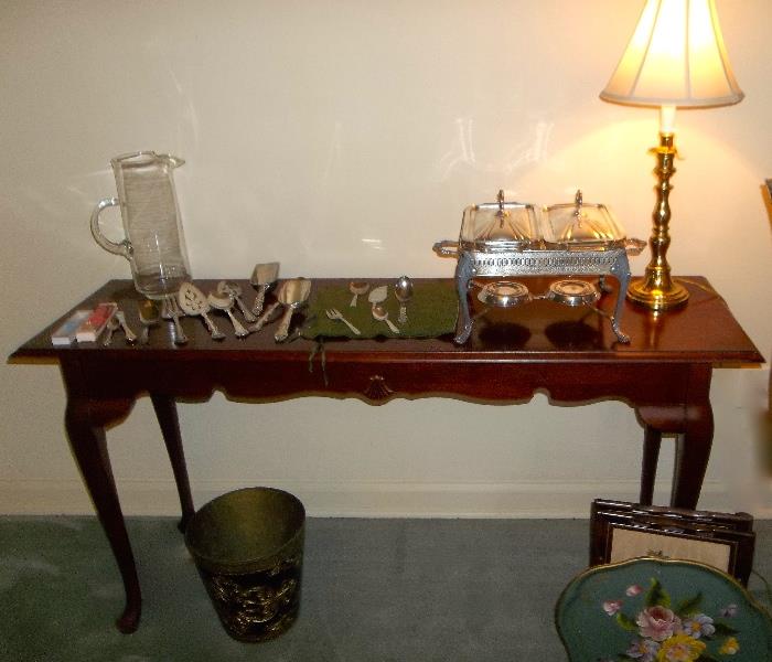 Queen Anne sofa table in like-new condition.  Assorted serving pieces and buffet ware.