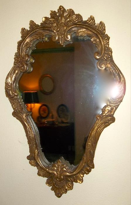 Unusual accent mirror in living room!