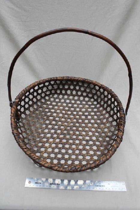 Woven fishing basket