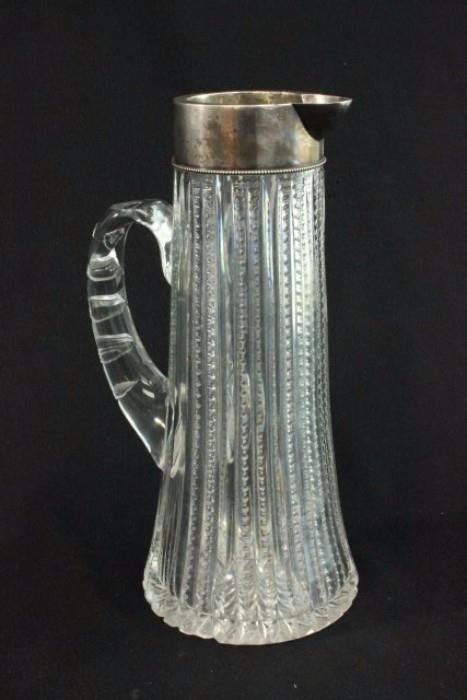 Lot #1243 Cut crystal, sterling pitcher 