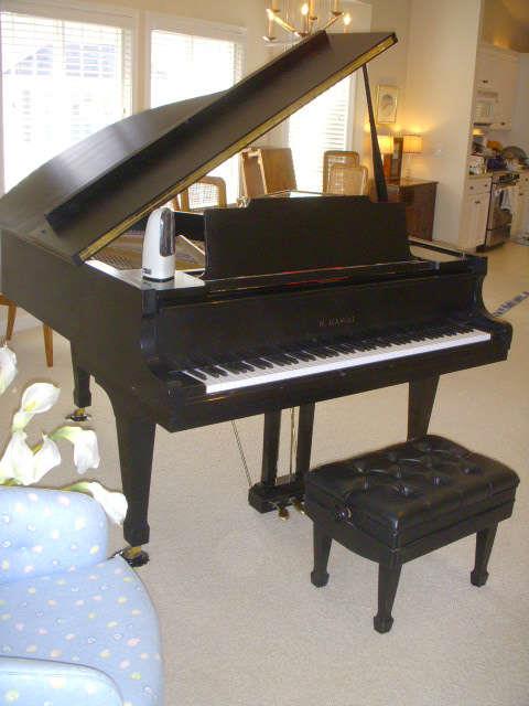 Kawai 1978 black grand piano and bench.  Piano has been well maintained and sounds great!  Recently tuned.  It is the Kawai KG-2C model, approximately 5' 8" long.  NICE!!!