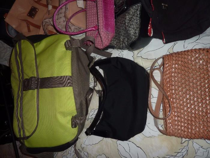 Black bag is Ralph Lauren, Brown is Fossil.  Many other bags including Guess, Vera Bradley, XOXO, Nine West and more