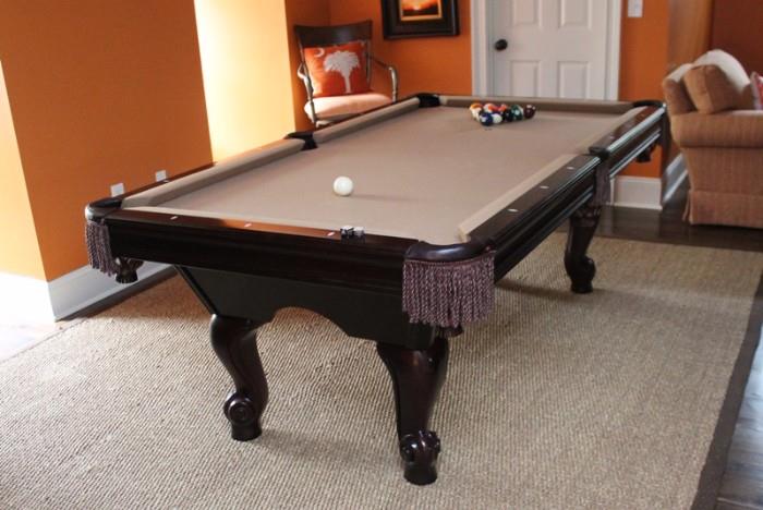 Classic Brunswick Pool Table covered in Khaki color felt- New Condition. 
