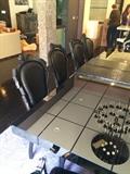Seats 12 plus black mirrored top dinning table all chairs are black gothic