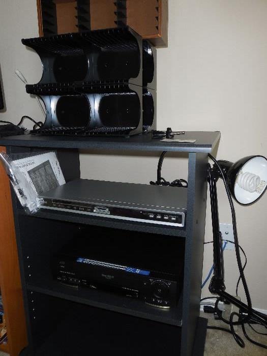stereo cabinet, RCA DVD player, JVC VHS player