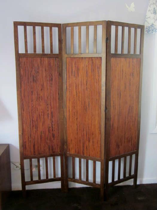 Three-panel solid wood screen.
