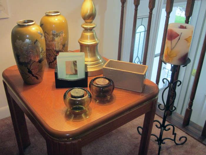 Pair of vintage, hand carved, mixed metal vases, wrought iron candle stand and misc. tabletop items.