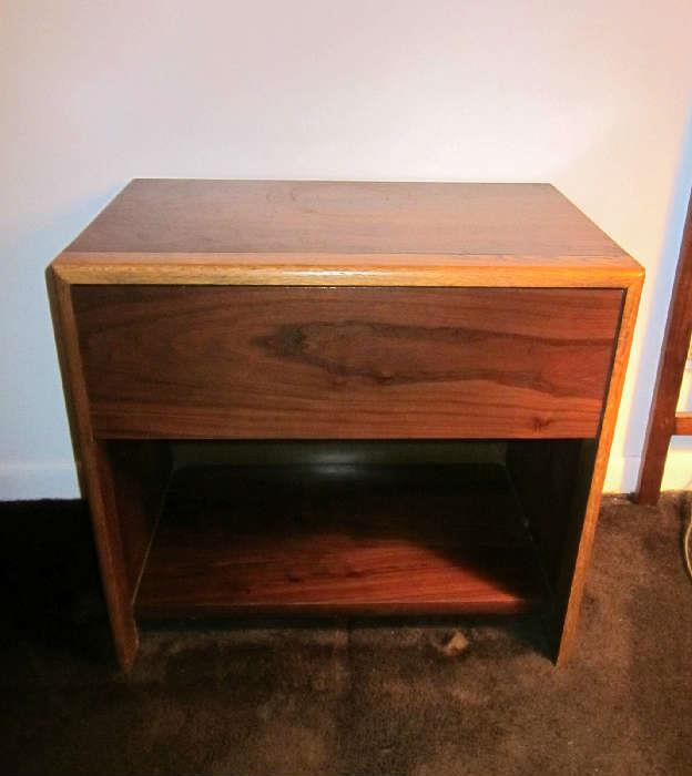 First of two of Mid-Century Modern nightstands of light and dark Oak, with one drawer and bottom shelf, by Lane, made in USA.  Great condition.