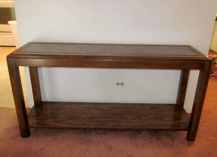 Dark wood sofa/console table, modified parsons style with bottom shelf.