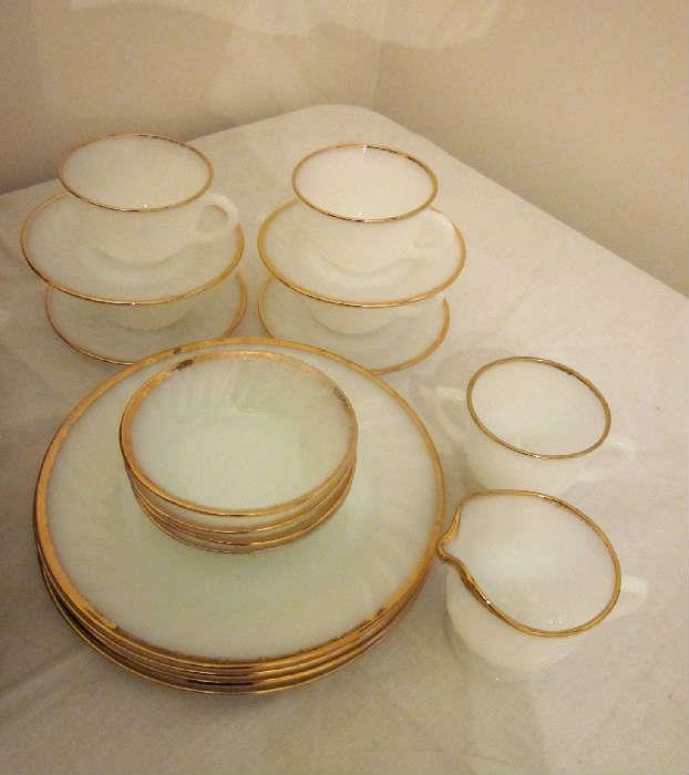 Vintage Fire King dinnerware "White Swirl"  with gold trim.