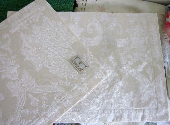 Set of four Waterford Whitmore Damask placemats.