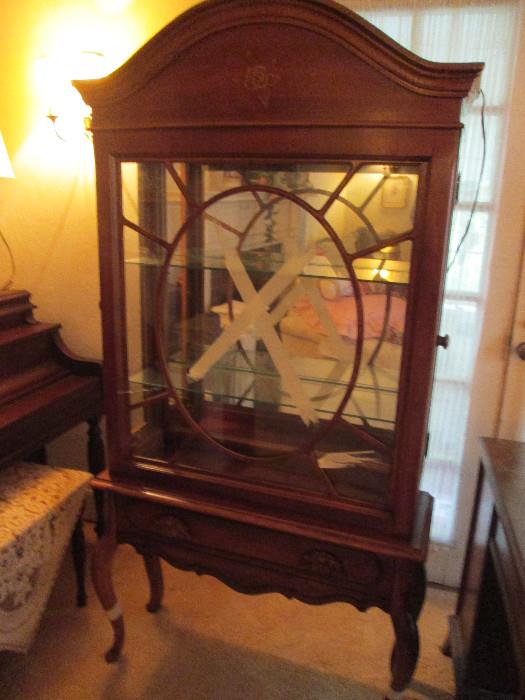 A beautiful China Cabinet.  We will get the tape off before auction!!