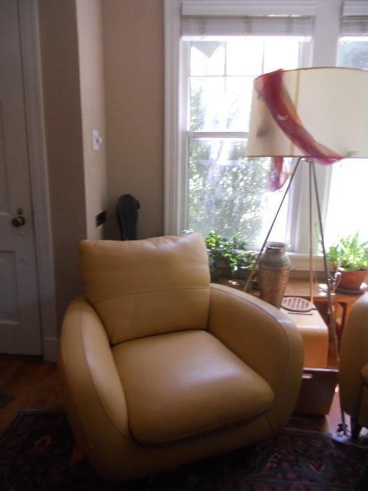 Yellow leather chair. Look at this floor lamp, really unusual and COOL.