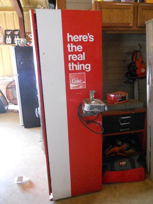 Side view of Vintage Coca-Cola Machine with Water Fountain