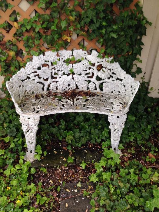 Wrought iron bench in grape pattern